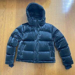 TNA super puff: black liquid shine